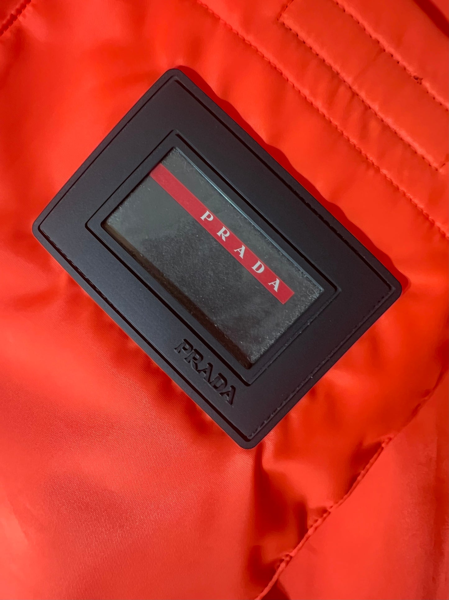2018 “Fluorescent Tangerine” Prada x Linea Rossa Nylon Puffer - S