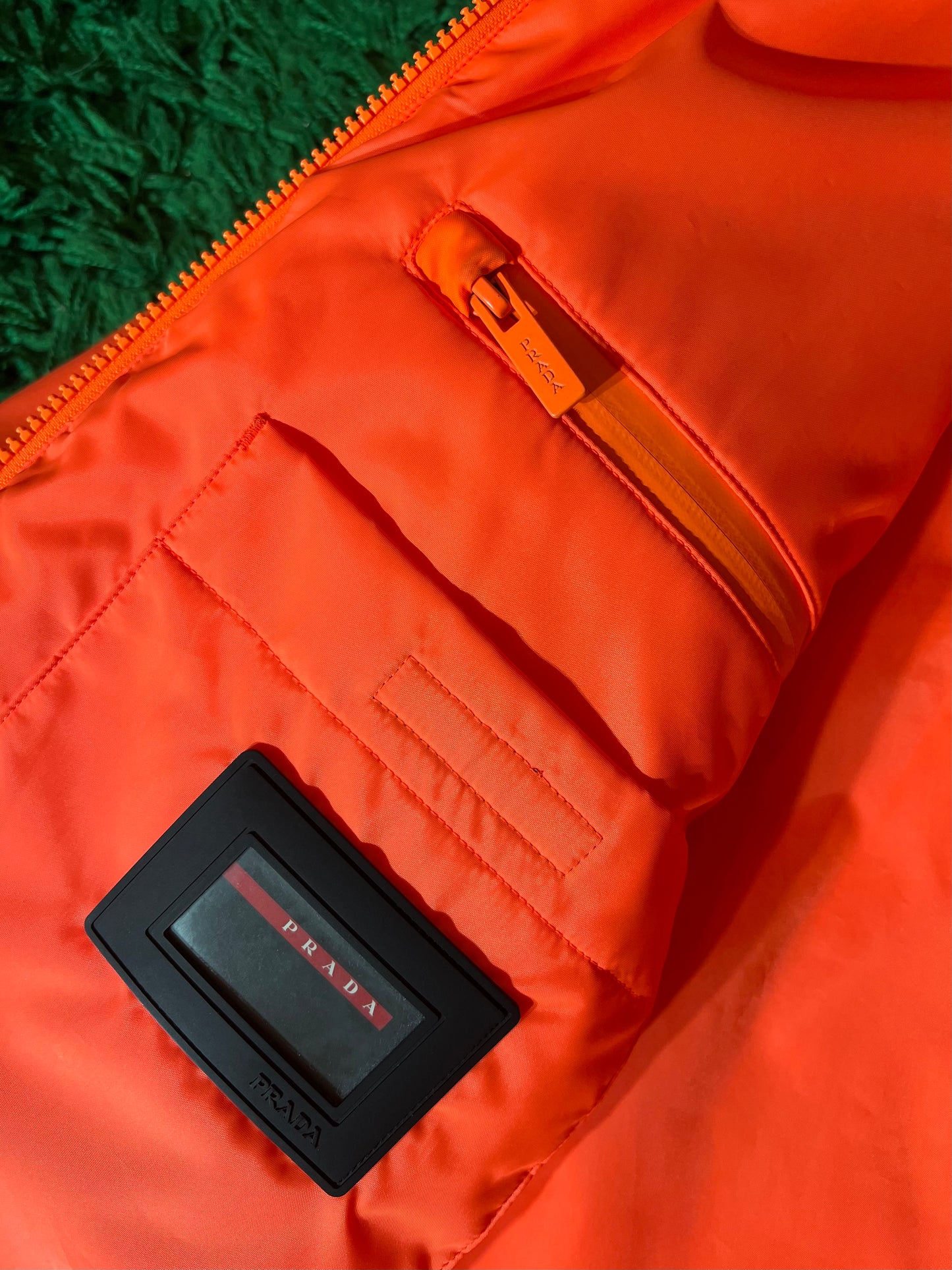 2018 “Fluorescent Tangerine” Prada x Linea Rossa Nylon Puffer - S